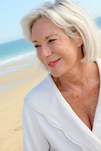 Portrait of happy senior woman in spa resort Stock Image