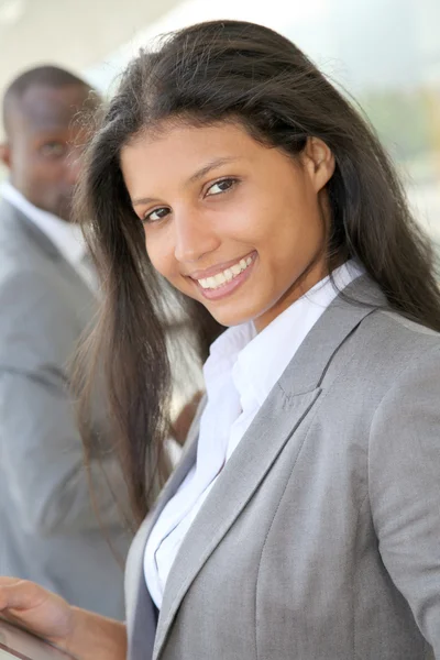 Portrait of smiling saleswoman — Stock Photo, Image