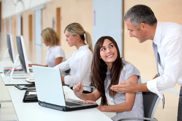 Business team working in the office on laptop computer — Stock Photo, Image