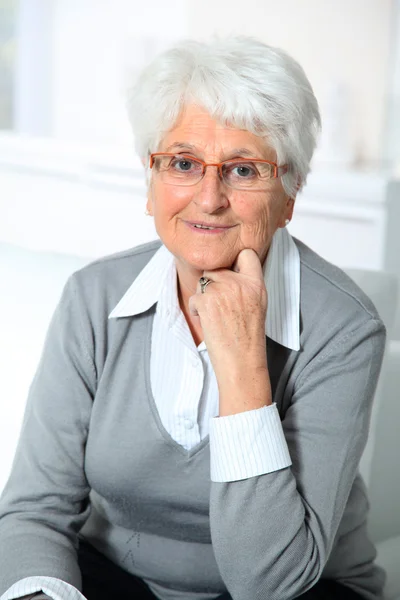 Closeup of smiling elderly woman — Stock Photo, Image