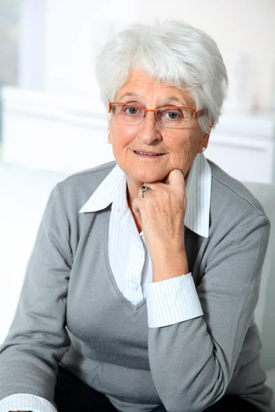 Closeup of smiling elderly woman — Stock Photo, Image