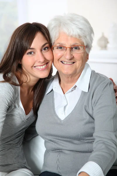 Closeup of elderly woman with young woman Stock Image