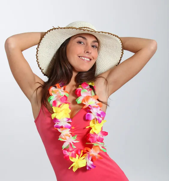 Woman with hawaiian outfit Stock Photo