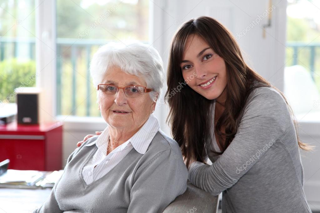 Closeup of elderly woman with young woman