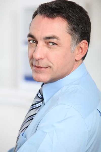 Closeup of businessman with blue shirt and tie — Stock Photo, Image