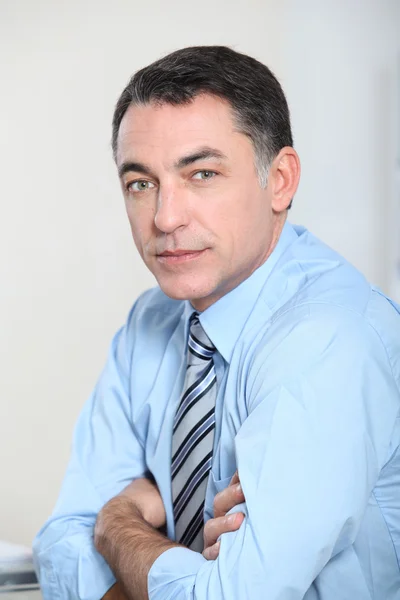 Closeup of businessman with blue shirt and tie — Stock Photo, Image