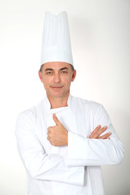 Beyaz arka plan ayakta chef clsoeup