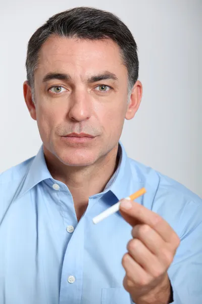 Closeup of man trying to quit smoking — Stock Photo, Image