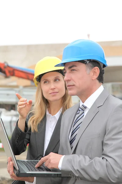 Business on construction site — Stock Photo, Image