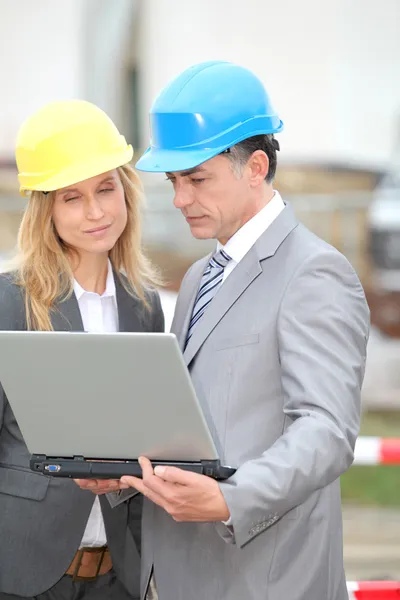 Business on construction site — Stock Photo, Image