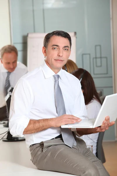 Closeup of sales manager in the office — Stock Photo, Image