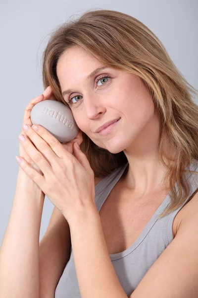 Woman holding stone with message — Stock Photo, Image