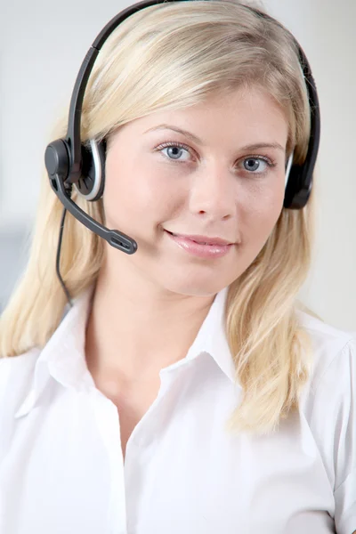 Closeup of blond woman with headphones and microphone — Stock Photo, Image