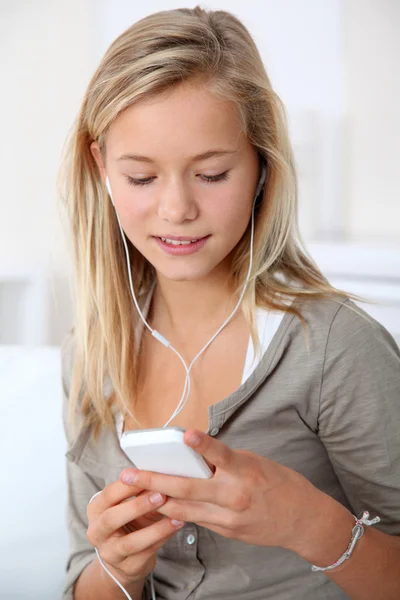 Closeup of beautiful blond girl with mobile phone — Stock Photo, Image