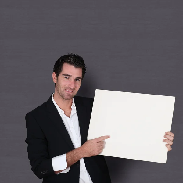 Roliga säljare anläggning whiteboard — Stockfoto