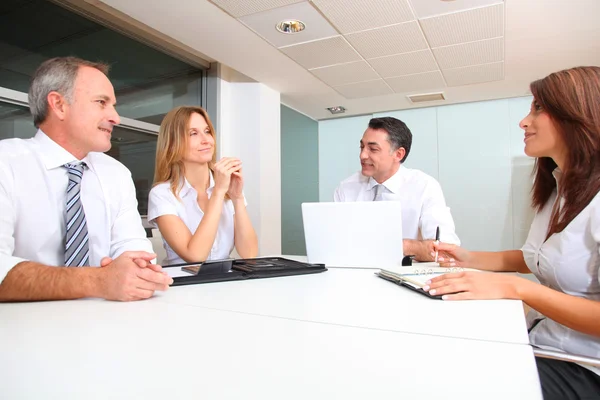 Reunião de negócios em torno da mesa Fotografias De Stock Royalty-Free