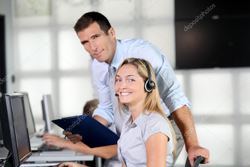 Blond woman with headphones in training course