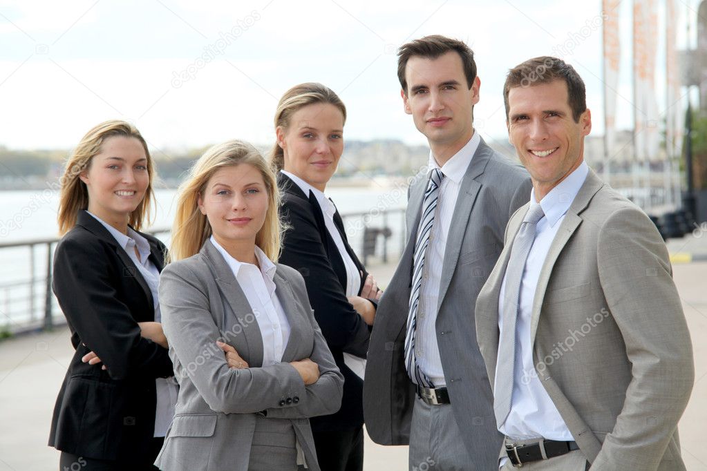 Group of business standing outside a trade fair