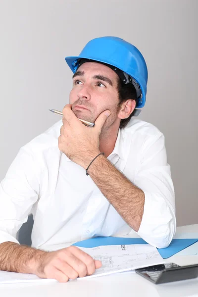 Site manager in office with thoughful look — Stock Photo, Image