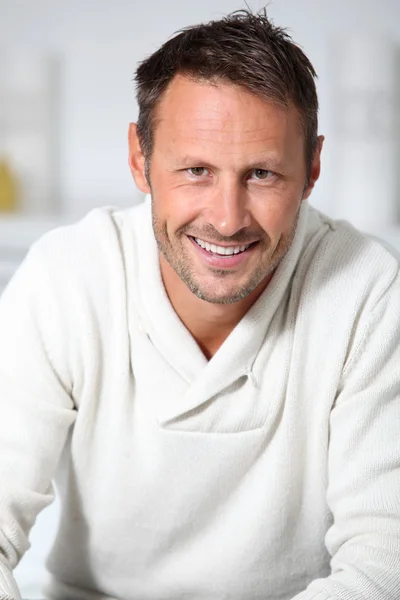 Closeup of hansdsome man with white sweater — Stock Photo, Image