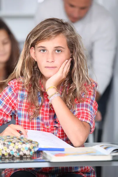 Closeup of student girl in classroom — Stock Photo, Image