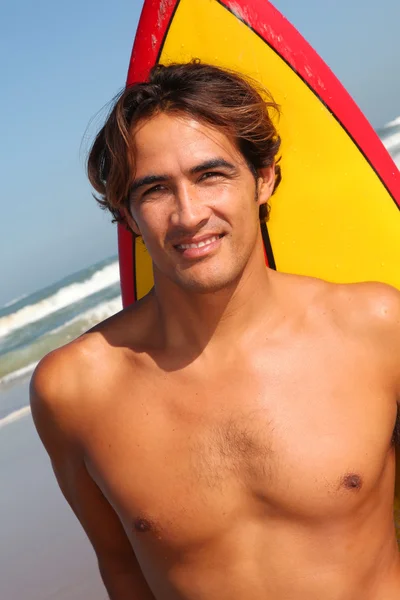 Portrait of handsome surfer at the beach — Stock Photo, Image