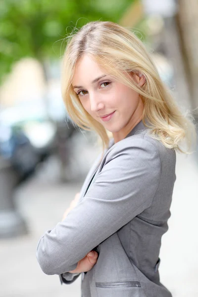 Beautiful businesswoman in town — Stock Photo, Image