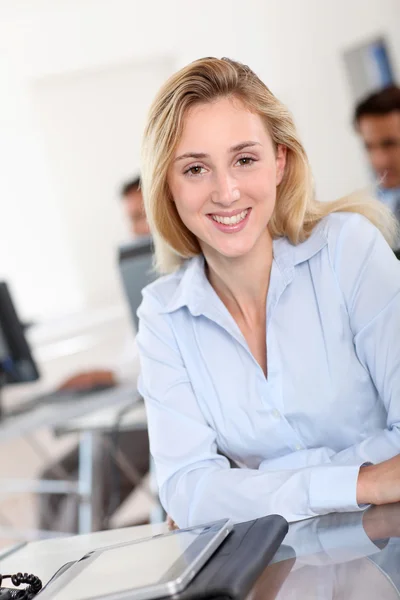 Portrait of smiling office worker Stock Picture