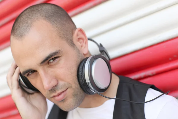 Young man with music headphones — Stock Photo, Image