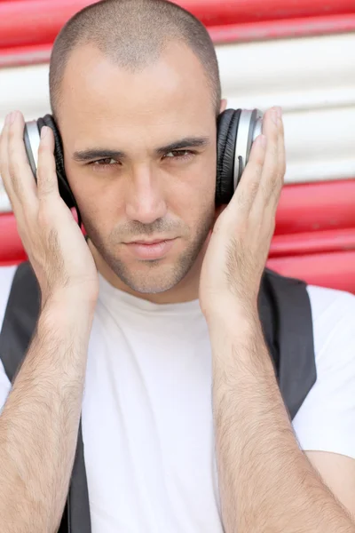 Young man with music headphones — Stock Photo, Image