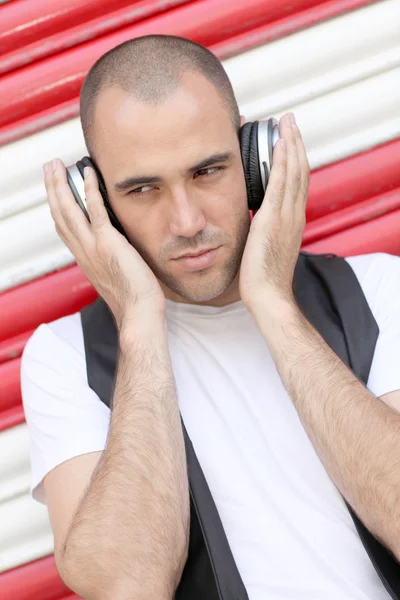 Young man with music headphones — Stock Photo, Image