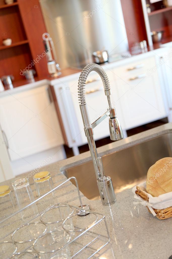 Closeup on kitchen faucet