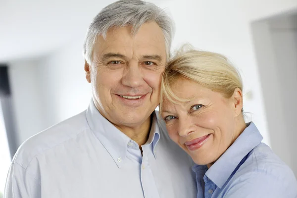 Portrait of cheerful senior couple at home — Stock Photo, Image