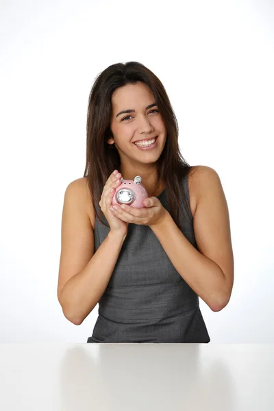 Portrait of beautiful woman holding piggy bank — Stock Photo, Image