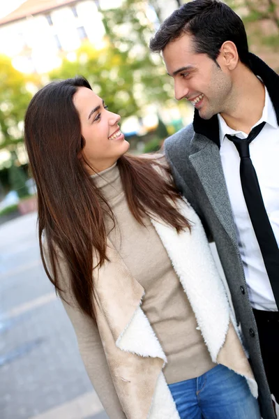 Trendy couple of lovers walking in the street — Stock Photo, Image