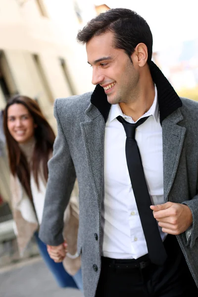 Trendy couple of lovers walking in the street — Stock Photo, Image