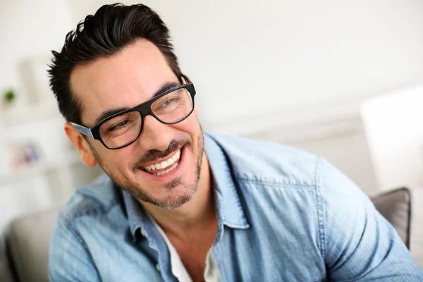 Cheerful trendy guy with black eyeglasses on — Stock Photo, Image