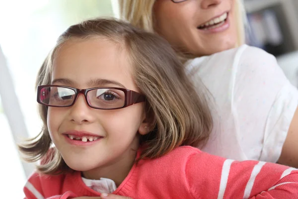 Mother and daughter with eyeglasses on Stock Image