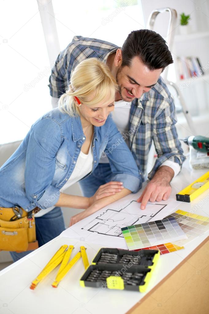 Couple designing home interior project