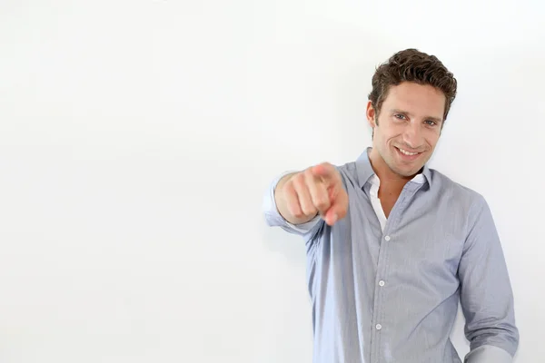 Adult man pointing at camera on white background — Stock Photo, Image