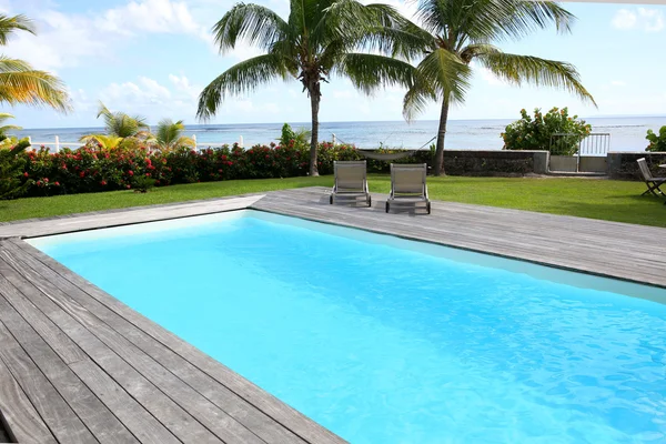 Private swimming pool in tropical area — Stock Photo, Image