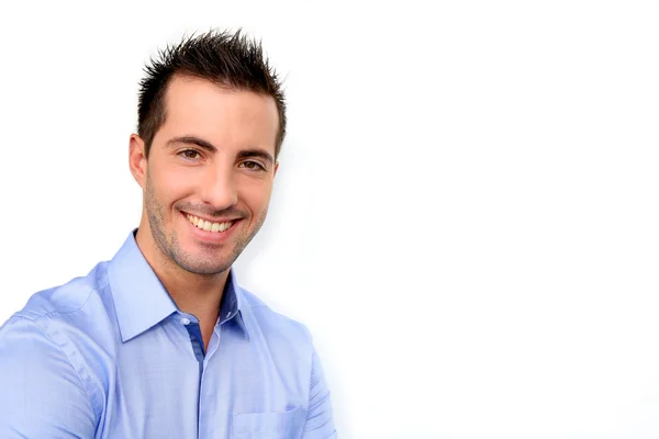 Smiling handsome guy leaning on white background — Stock Photo, Image