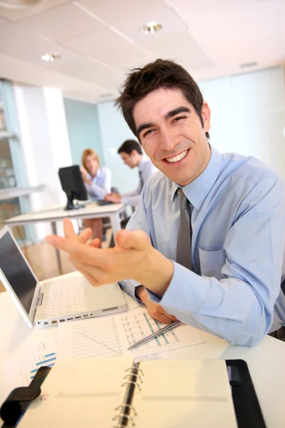 Cheerful salesman working on laptop computer — Stock Photo, Image