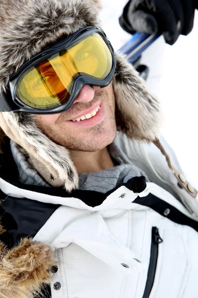 Portrait of swnowboarder standing on snow track Royalty Free Stock Photos