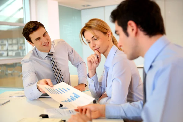 Sales director presenting business plan to team Stock Photo