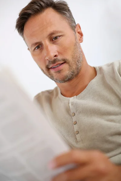 Man with newspaper — Stock Photo, Image