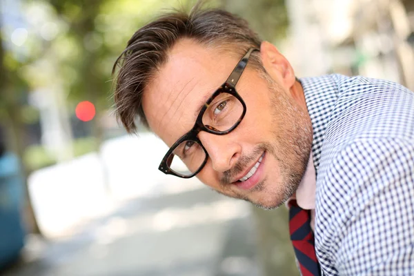 Trendy guy with eyeglasses and tie — Stock Photo, Image