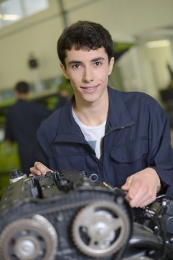 Student in auto mechanics clipart