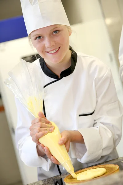 Pasticceria cuoco studente ragazza — Foto Stock