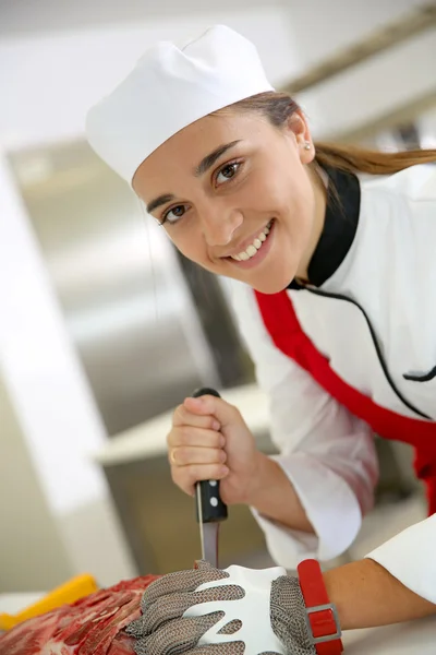 Butcher girl at work — Stock Photo, Image